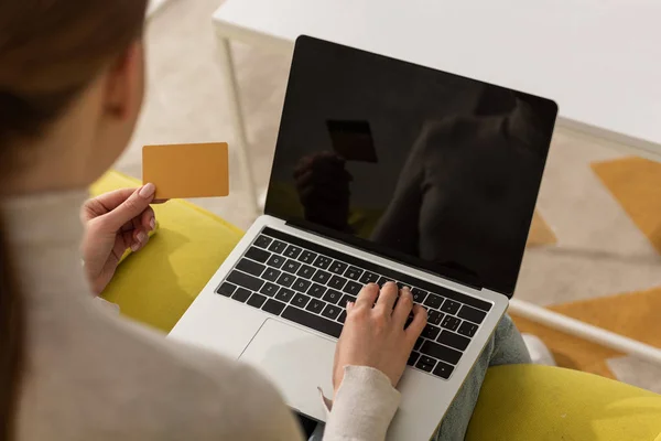 a woman on her computer