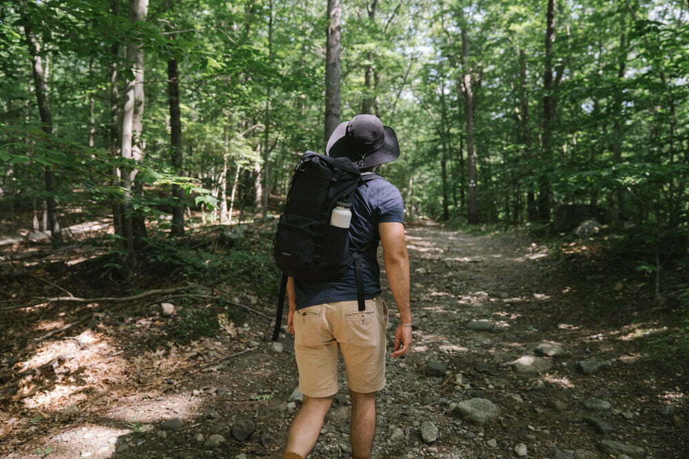 A man hiking through the woods