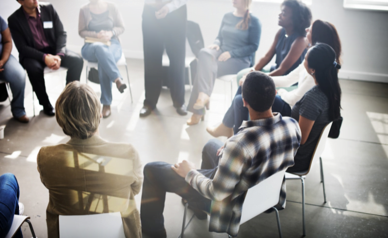 A group of people in group therapy